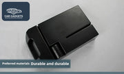 Black molded ABS armrest organizer photographed from the underside