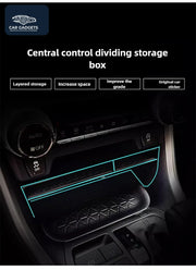 Front console dividing shelf highlighting layered storage and usable space