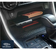 Toyota RAV4 front console shelf creating a second storage level