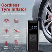 Cordless tyre inflator with features highlighted on a road background