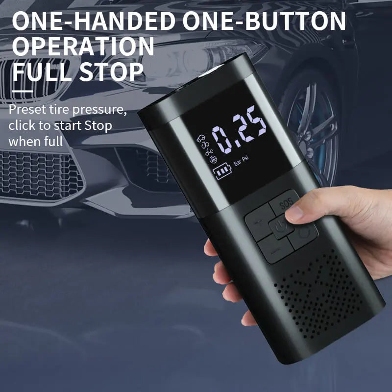 Cordless tire inflator held by hand near a parked car, showing one-button operation
