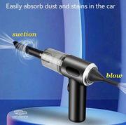 Air blower nozzle cleaning dust from a dashboard vent