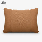 Cognac three-panel car lumbar pillow on a white background