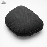 Black perforated car neck pillow on a white background