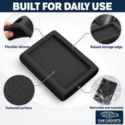 Flexible silicone armrest cover with raised storage edge, textured surface and washable design