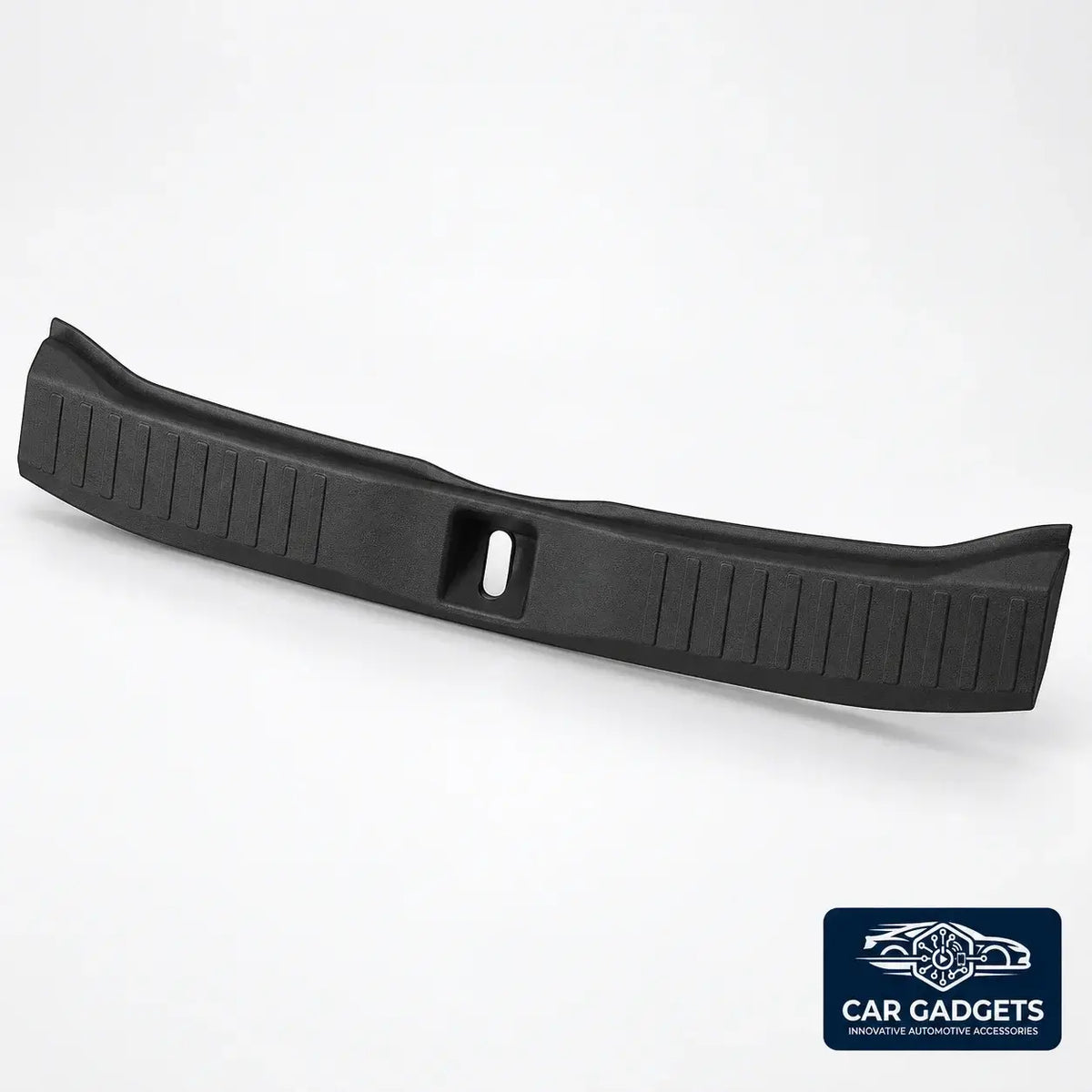 Close view of black TPE trunk sill guard ribs, curved edge and latch opening