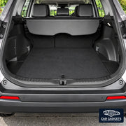 Black inner cargo threshold guard shown at the rear opening of a red vehicle; six-piece set only