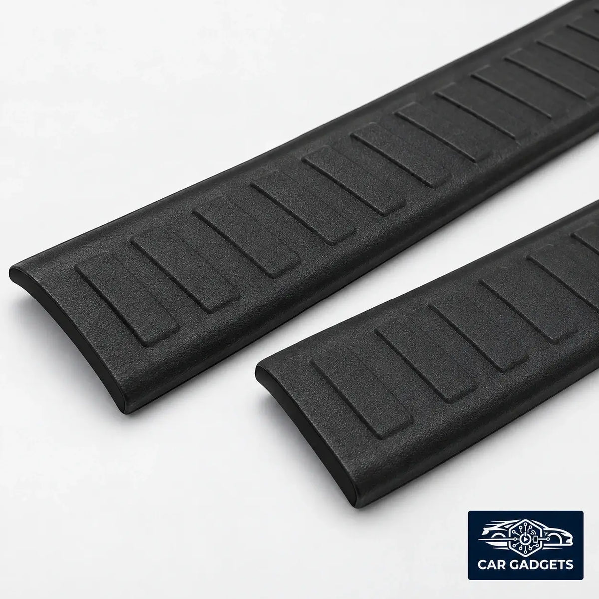 Close view of the raised rib texture on the black door sill protector