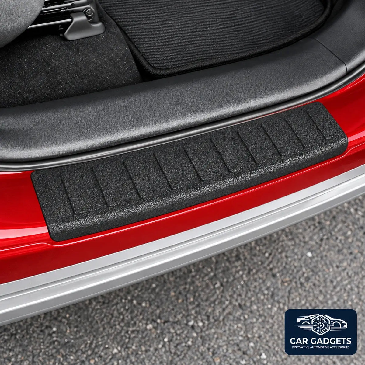 Close view of the black rear exterior bumper loading-edge protector